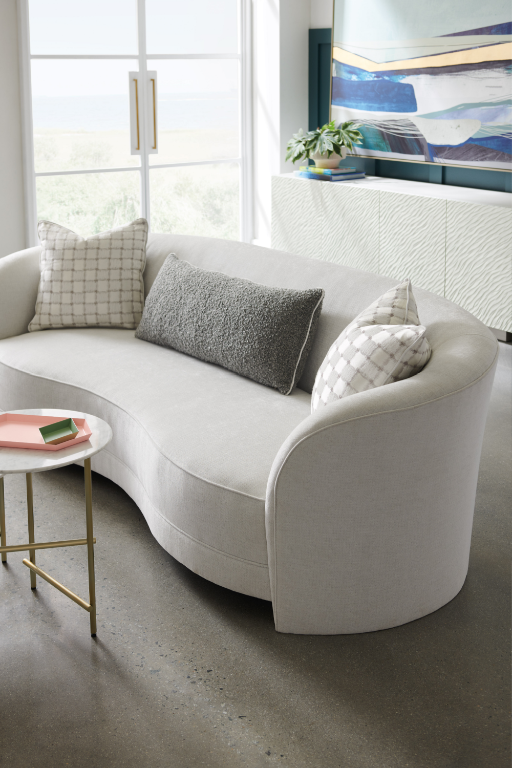 Light Gray Curved Sofa | Caracole Ahead Of The Curve | Caracole.eu.com