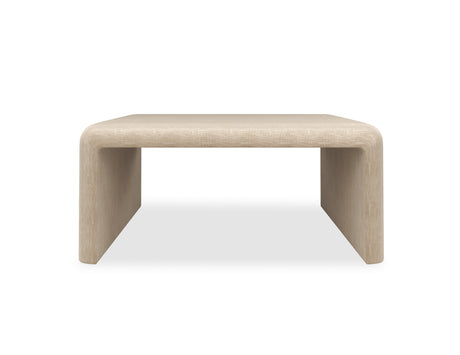 Oatmeal upholstered Coffee Table | Caracole Bridge the Gap