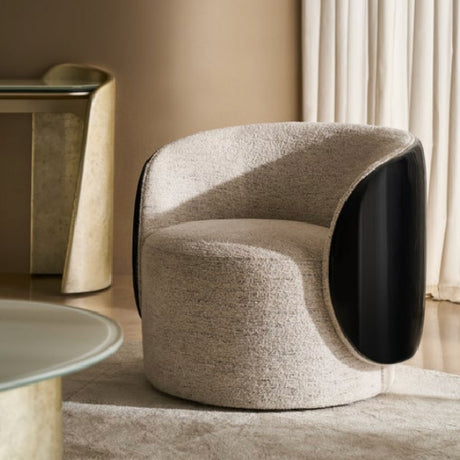 round accent chair fabric and wood. caracole.eu.com